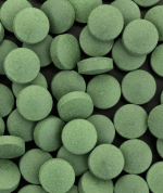 A close-up of round tablets.